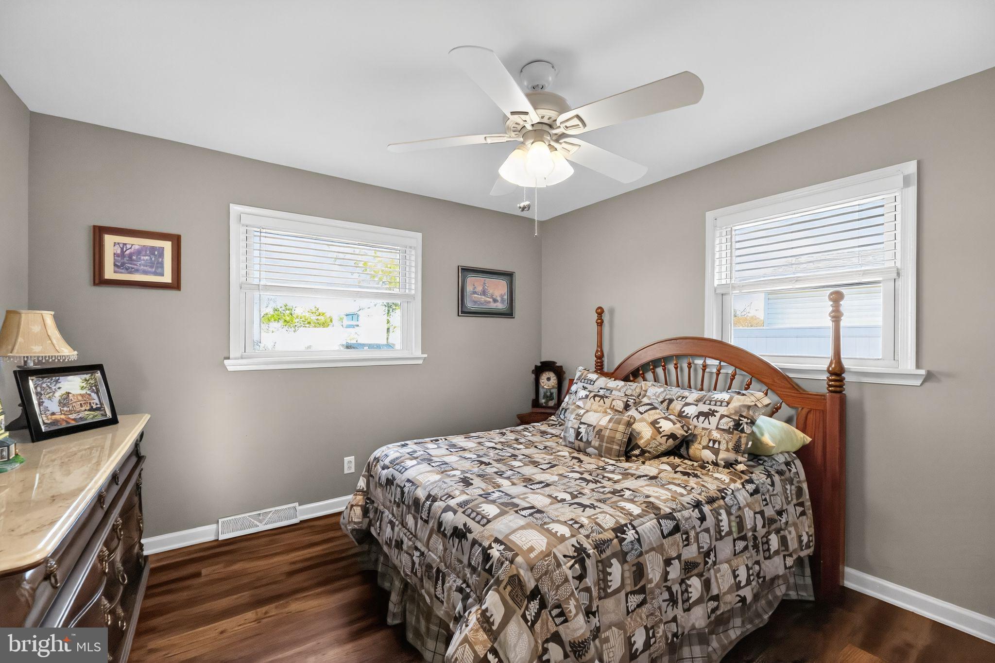 15 Winslow Road Sewell, NJ 08080 - Photo 10 of 18 a bedroom with a bed and wooden floor
