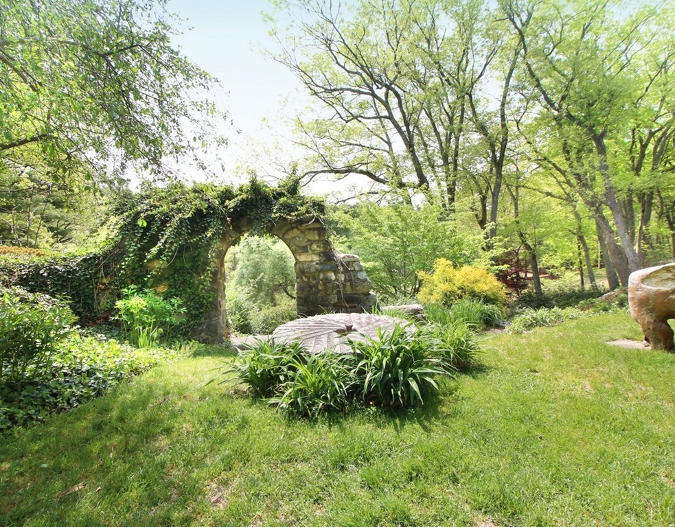 6 Millstone Lane Lincoln, MA 01773 - Photo 21 of 30 a fire hydrant in the middle of a field