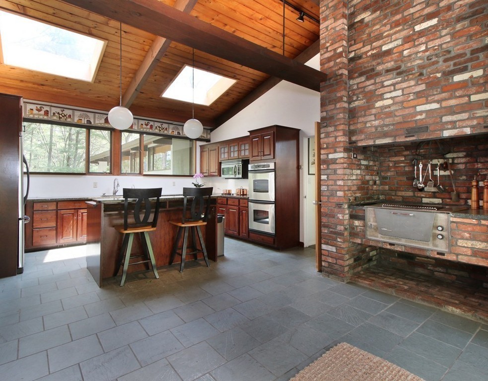 6 Millstone Lane Lincoln, MA 01773 - Photo 8 of 30 a view of a dining area with furniture and chandelier
