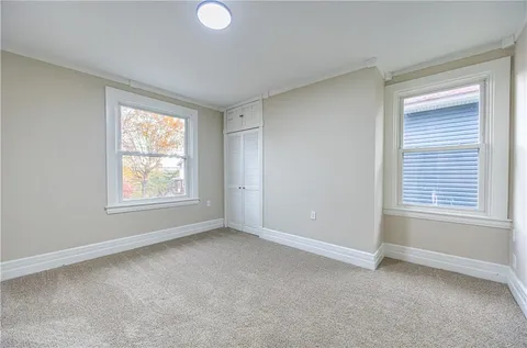 a view of an empty room and window