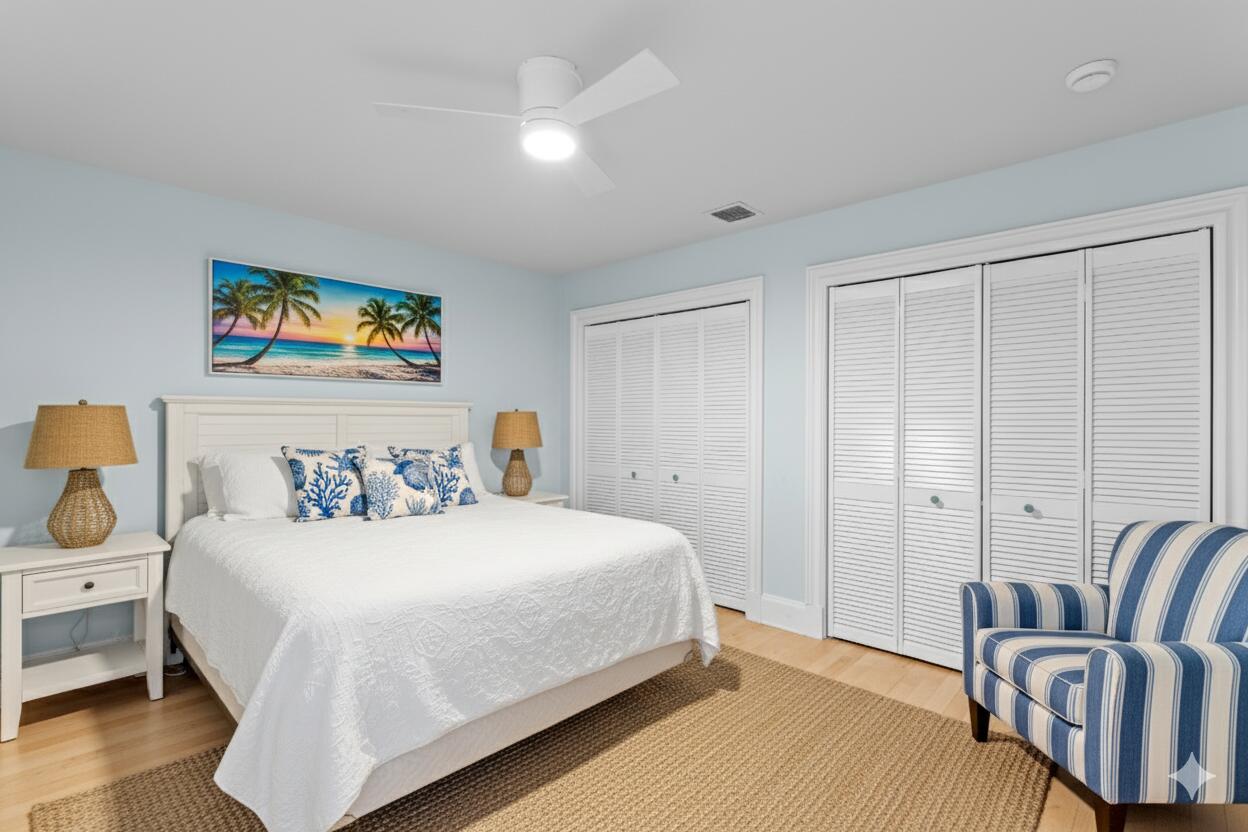 200 Ellamar Road West Palm Beach, FL 33405 - Photo 15 of 20 a bedroom with a bed and furniture