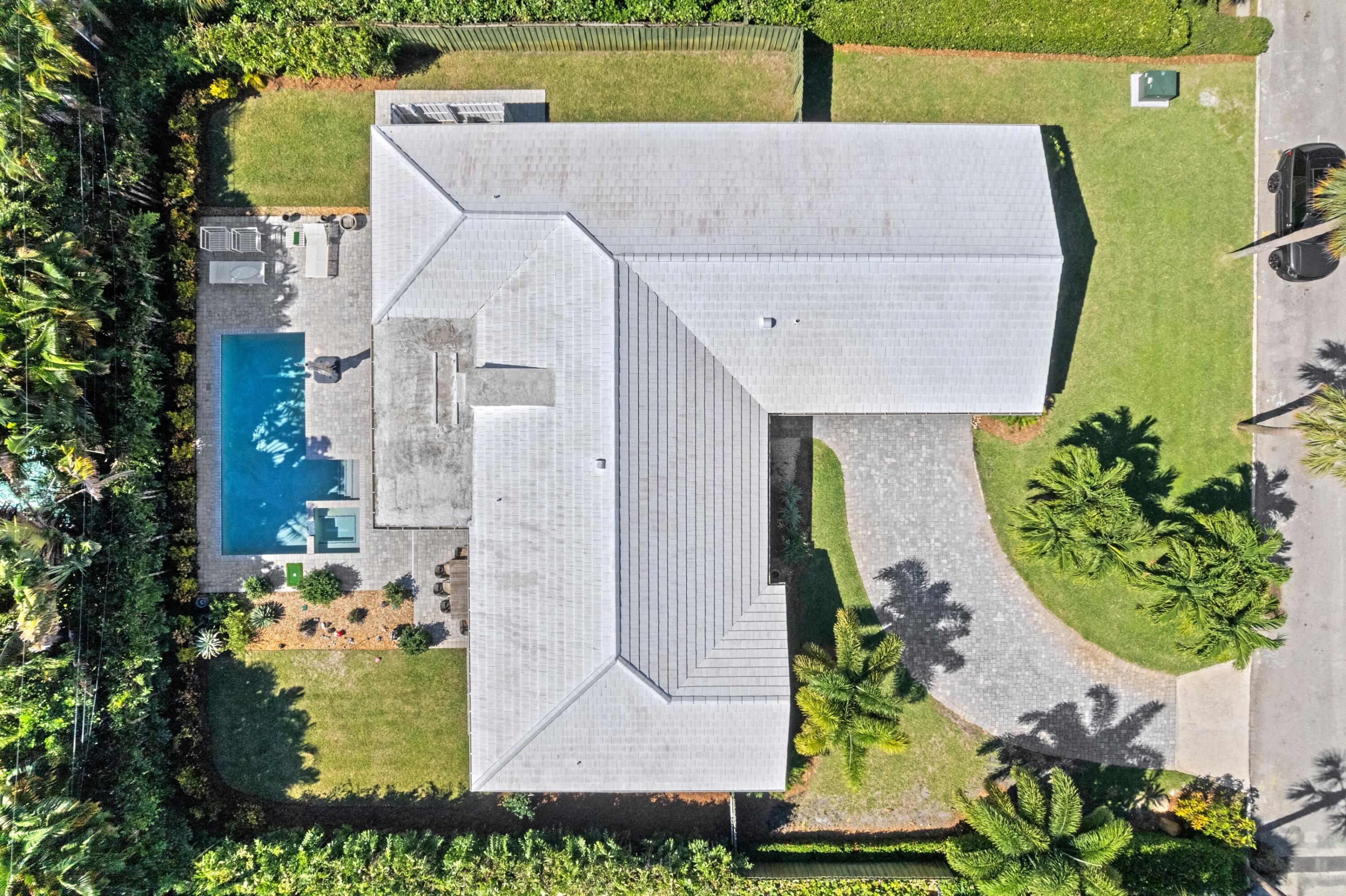 200 Ellamar Road West Palm Beach, FL 33405 - Photo 3 of 20 an aerial view of a house with a swimming pool