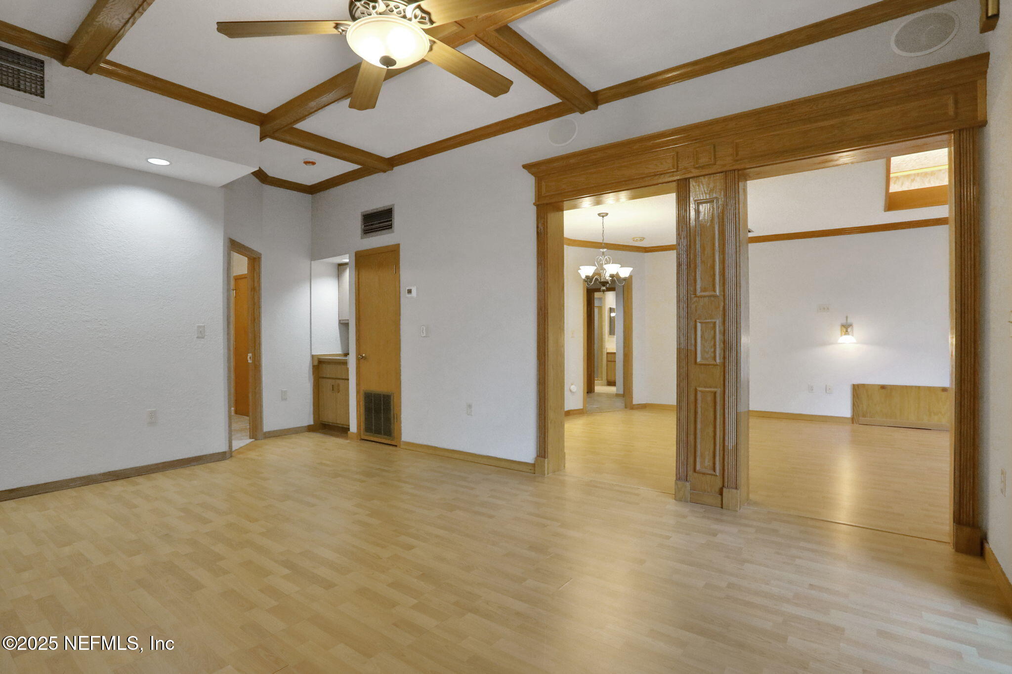 2970 Ravines Road, Unit 1308 Middleburg, FL 32068 - Photo 16 of 33 a view of a hallway with a chandelier