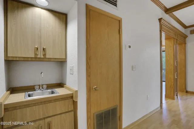 an empty room with walk in closet