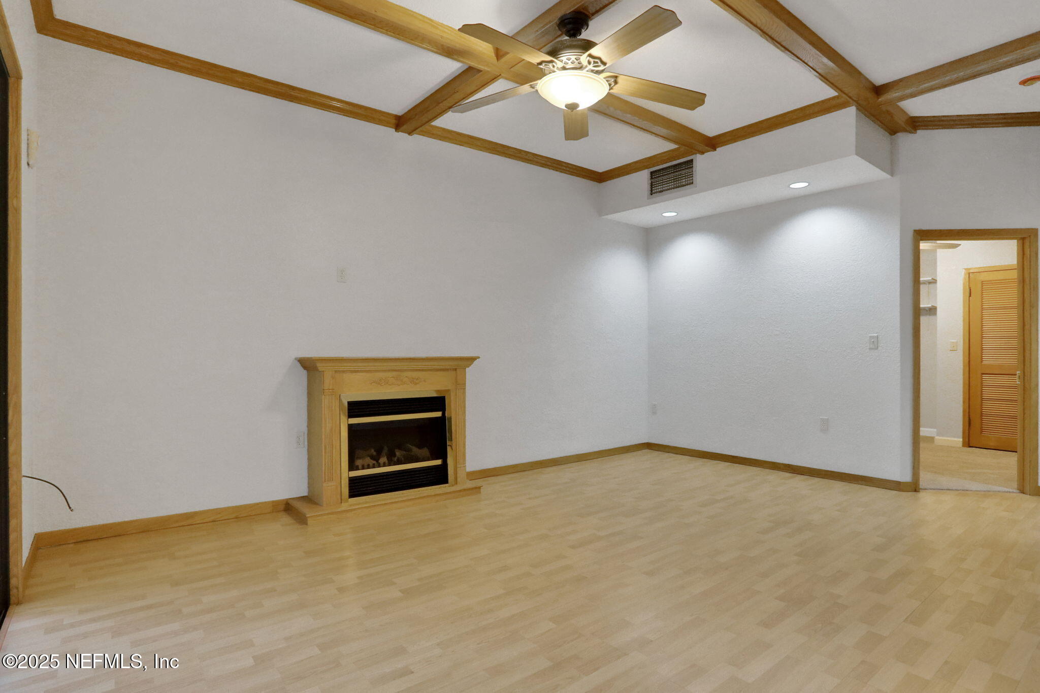 2970 Ravines Road, Unit 1308 Middleburg, FL 32068 - Photo 19 of 33 a view of an empty room with a ceiling fan