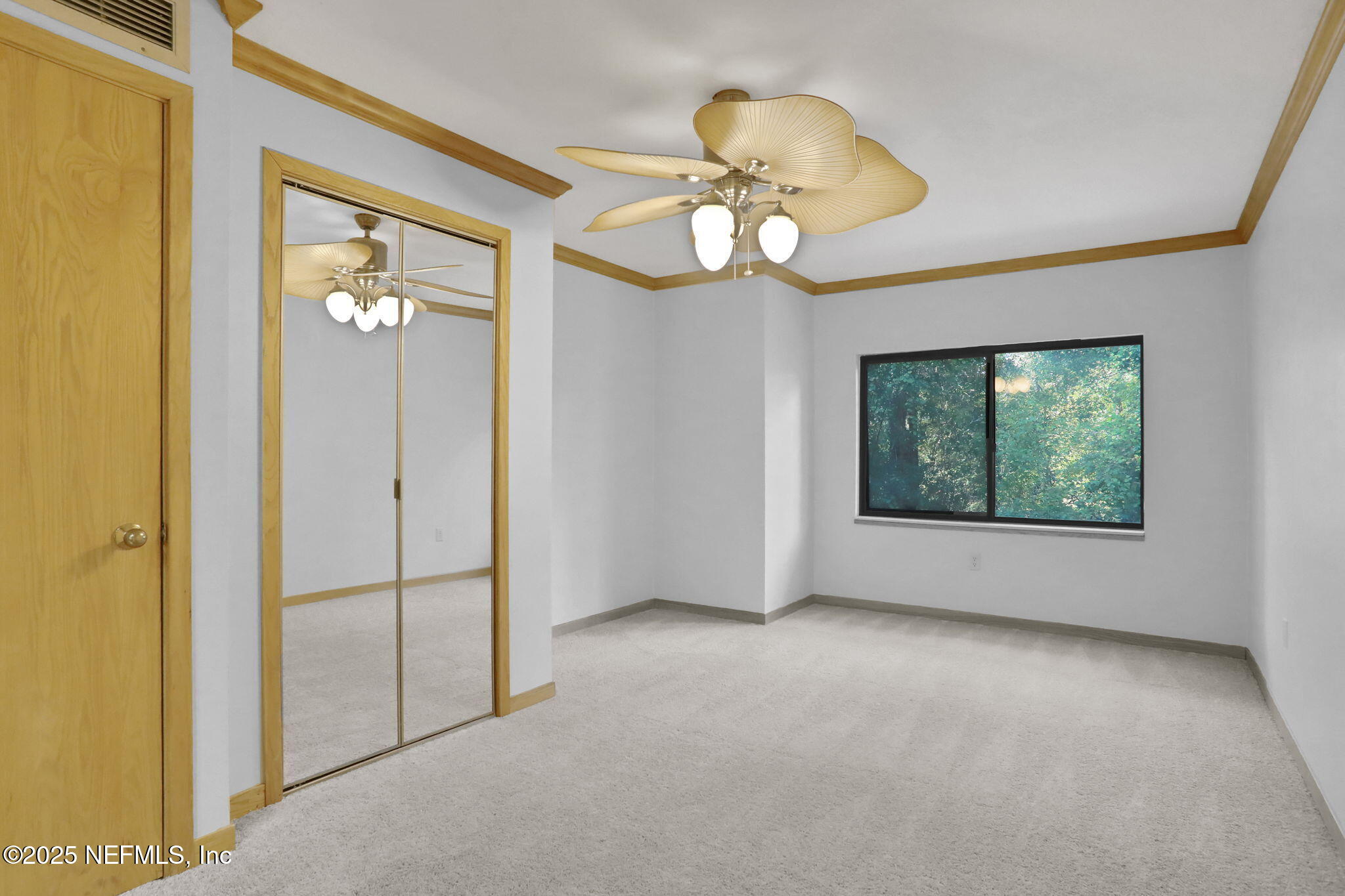 2970 Ravines Road, Unit 1308 Middleburg, FL 32068 - Photo 24 of 33 a view of an empty room with a window