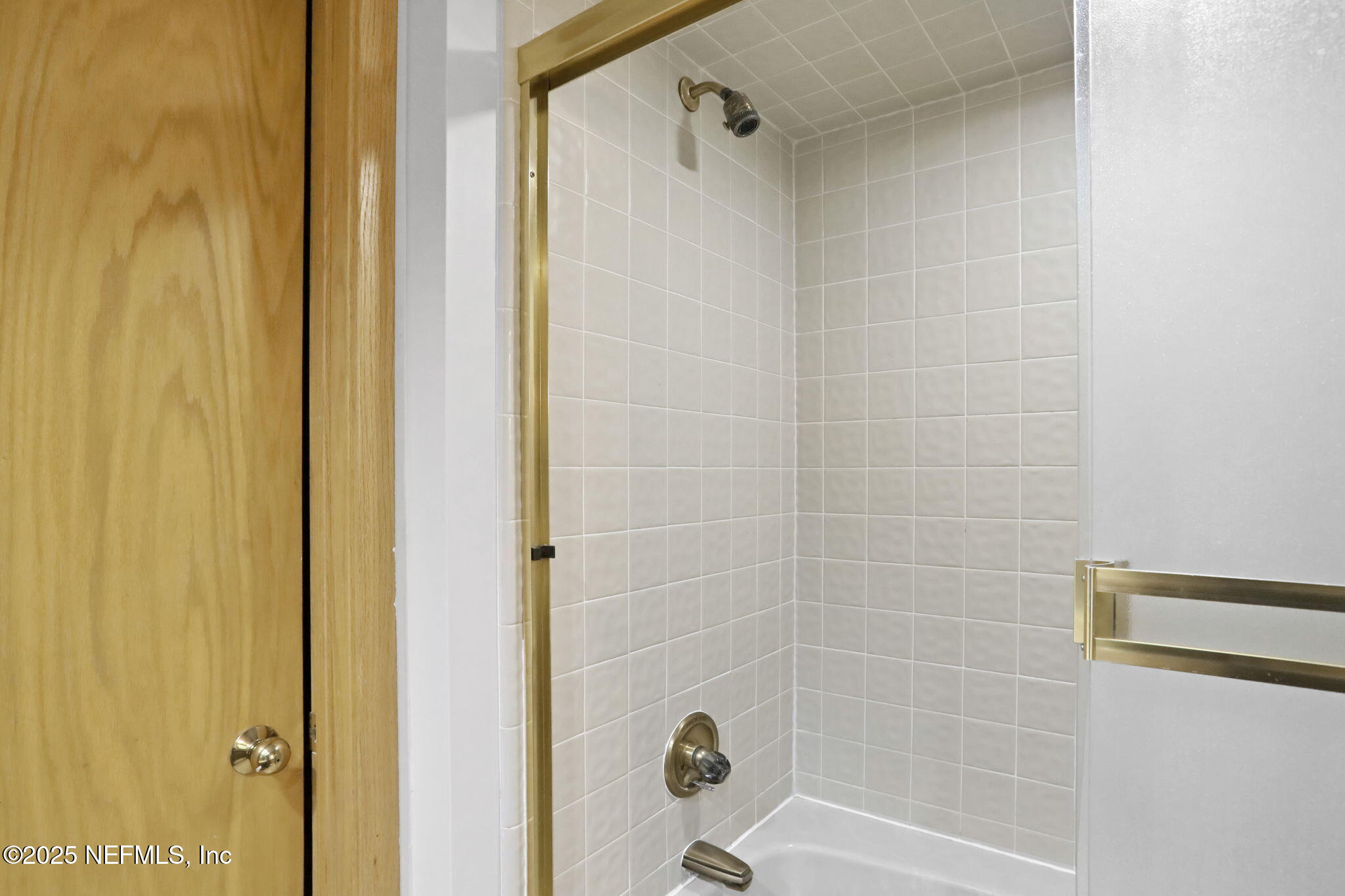 2970 Ravines Road, Unit 1308 Middleburg, FL 32068 - Photo 26 of 33 a bathroom with a shower