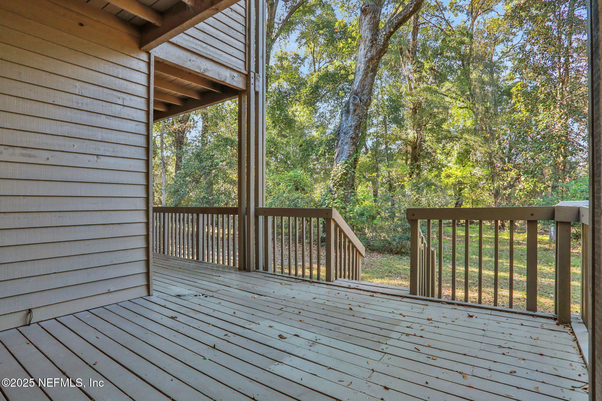 2970 Ravines Road, Unit 1308 Middleburg, FL 32068 - Photo 30 of 33 a view of balcony with wooden floor