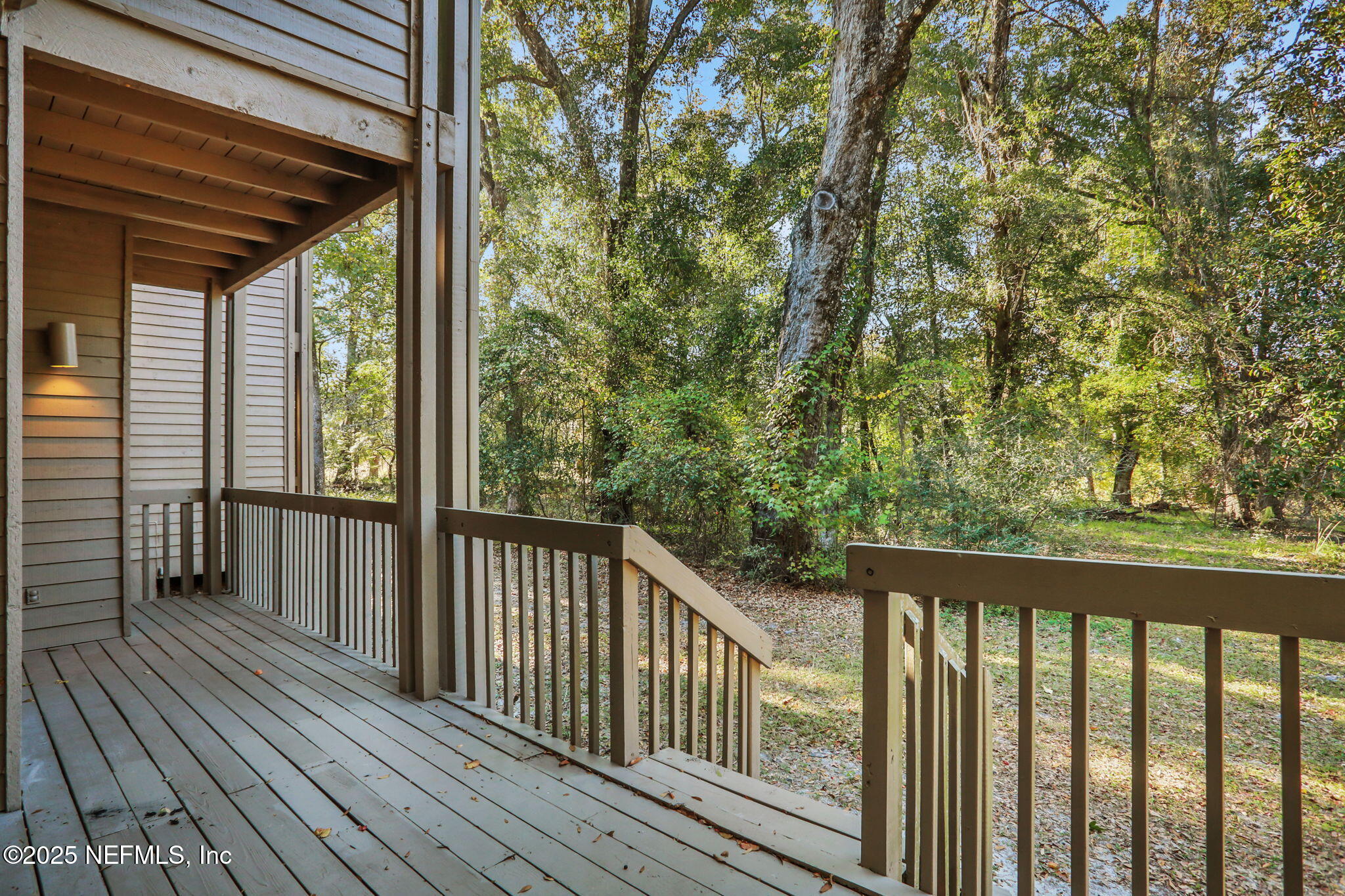 2970 Ravines Road, Unit 1308 Middleburg, FL 32068 - Photo 32 of 33 a view of balcony with wooden floor