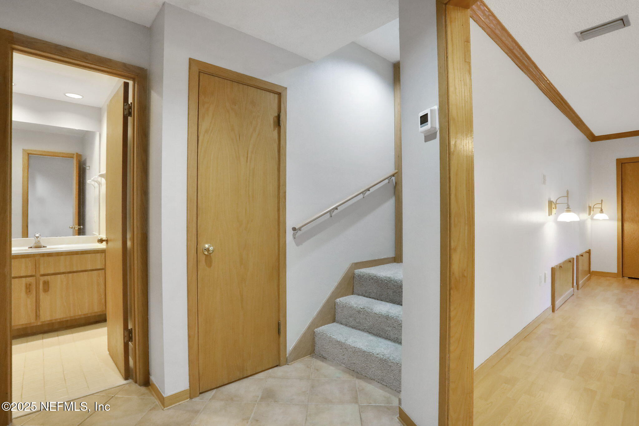 2970 Ravines Road, Unit 1308 Middleburg, FL 32068 - Photo 4 of 33 a view of a hallway with furniture and floor to ceiling window