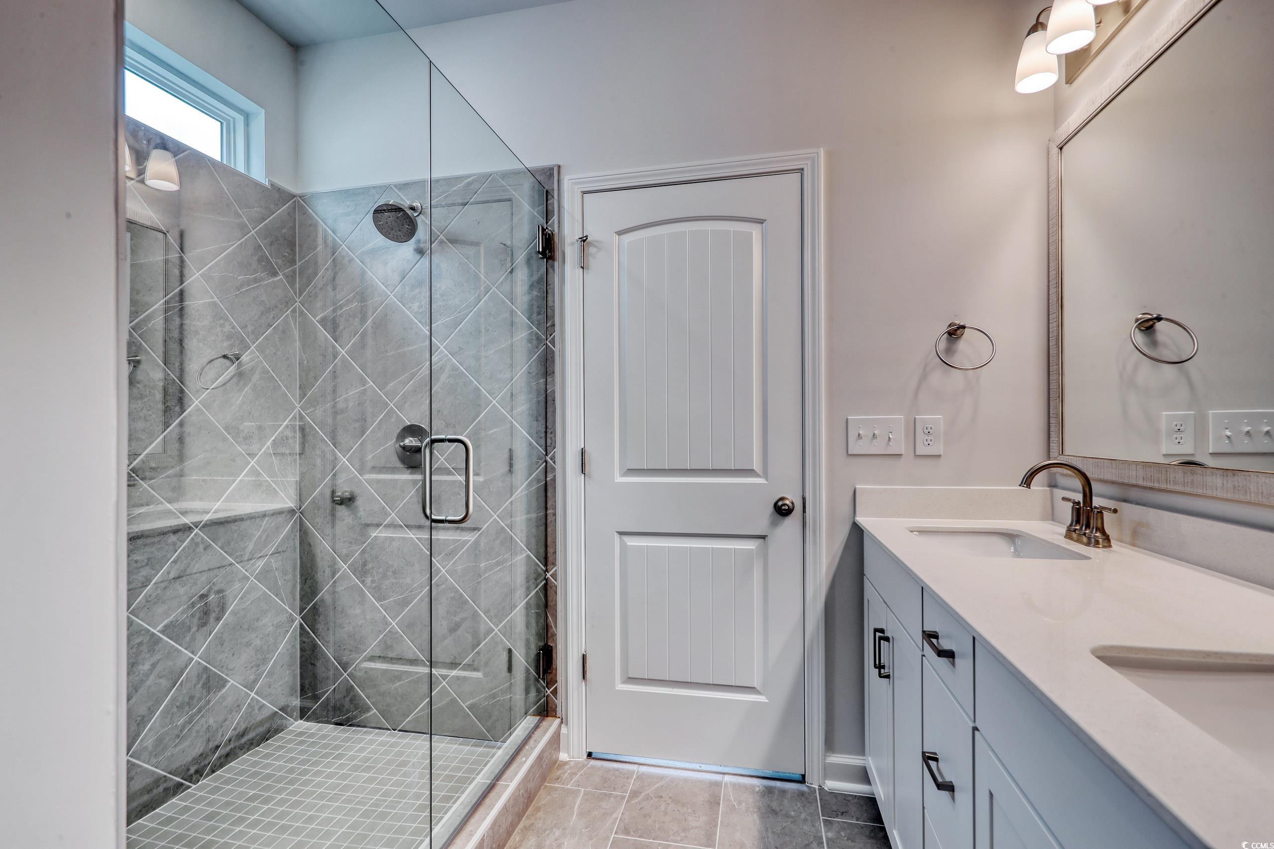 160 Azure Loop Myrtle Beach, SC 29588 - Photo 18 of 36 Bathroom with tile patterned flooring, vanity, and