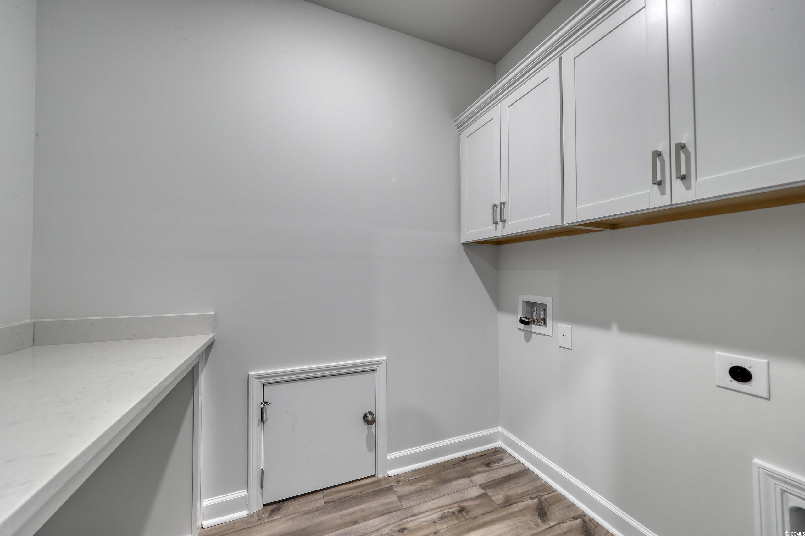 160 Azure Loop Myrtle Beach, SC 29588 - Photo 20 of 36 Clothes washing area featuring light hardwood / wo