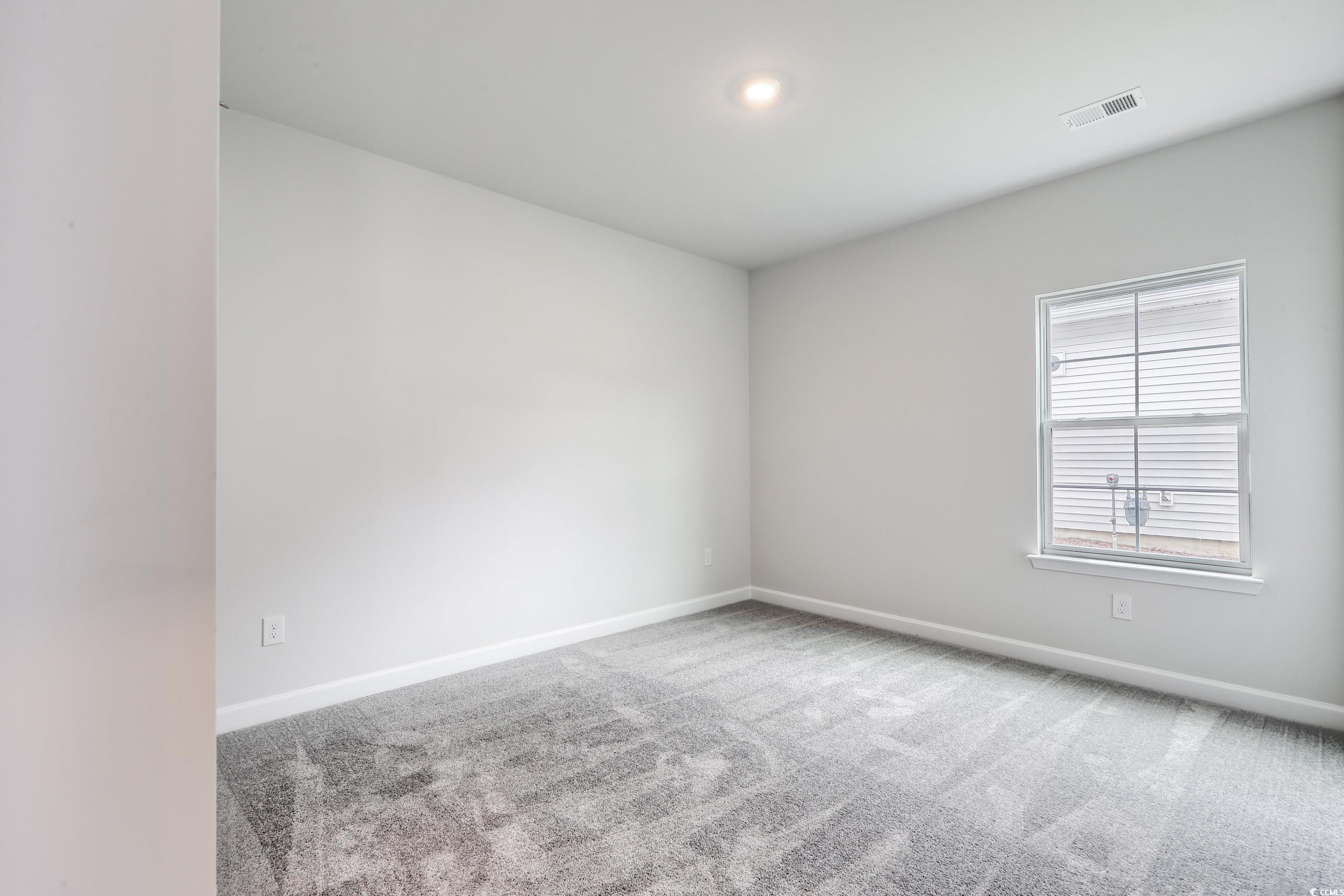 160 Azure Loop Myrtle Beach, SC 29588 - Photo 4 of 36 View of carpeted empty room