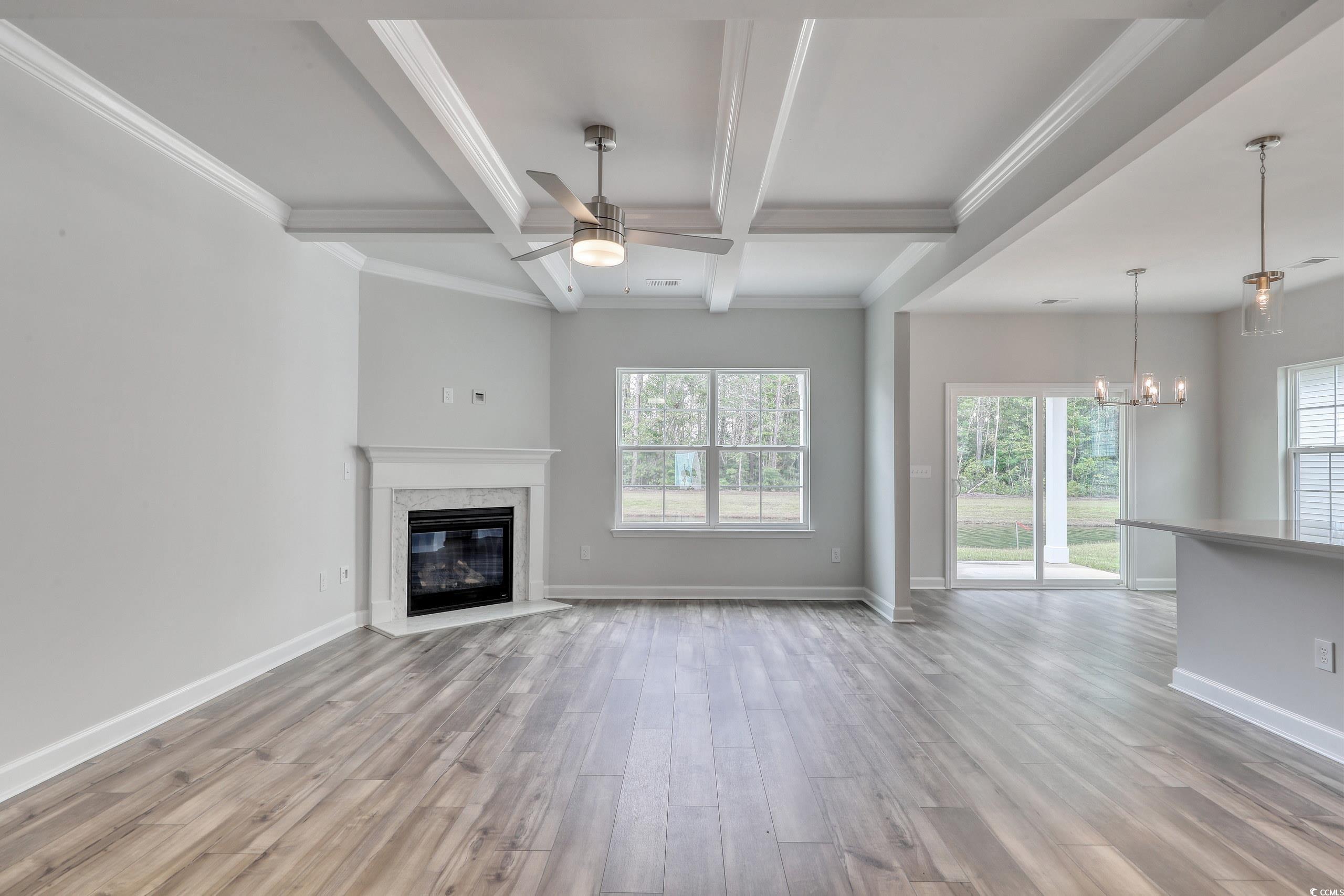 160 Azure Loop Myrtle Beach, SC 29588 - Photo 8 of 36 Unfurnished living room with ceiling fan with nota