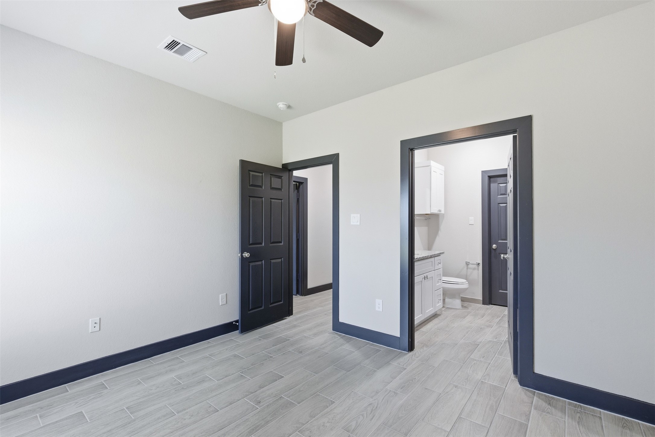 9412 Crofton Street, Unit B Houston, TX 77016 - Photo 7 of 20 wooden floor in an empty room