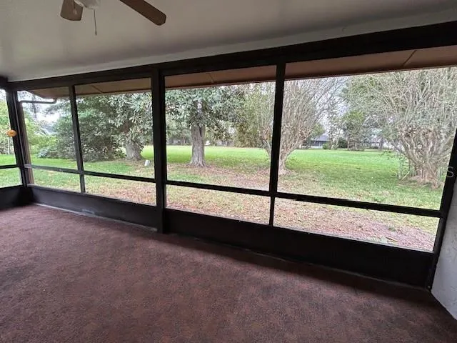 a view of large building with a big yard