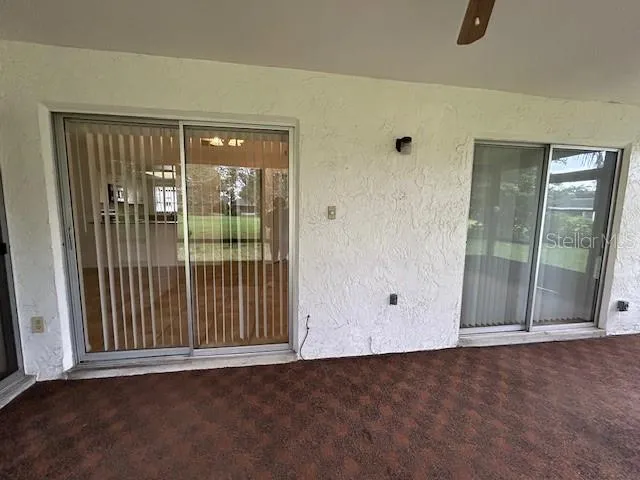 an empty room with sliding door