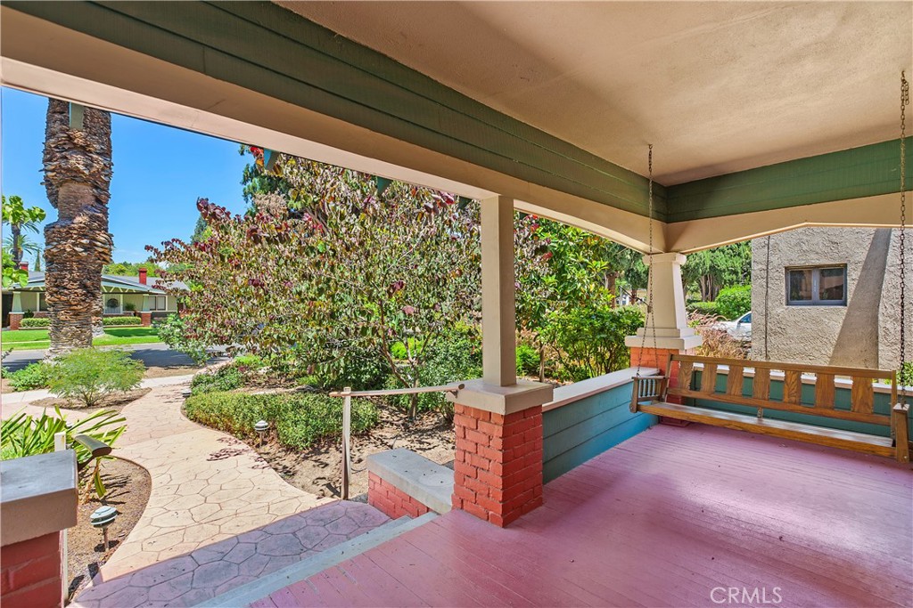 3892 Oakwood Place Riverside, CA 92506 - Photo 3 of 36 This front porch invites you to sit on the bench swing and enjoy the neighborhood views.