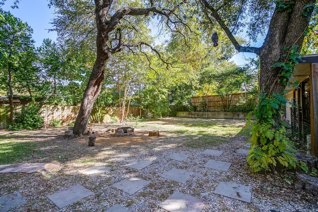 6455 Waverly Way Fort Worth, TX 76116 - Photo 13 of 16 a view of backyard with tree