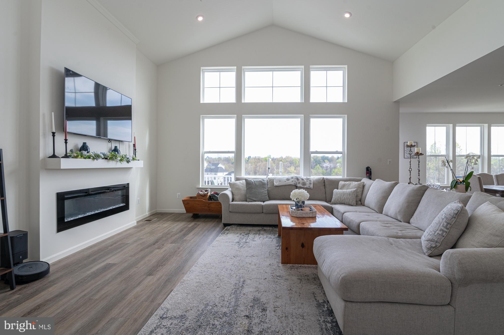 411 Karn Place Brunswick, MD 21716 - Photo 2 of 10 a living room with furniture and a fireplace