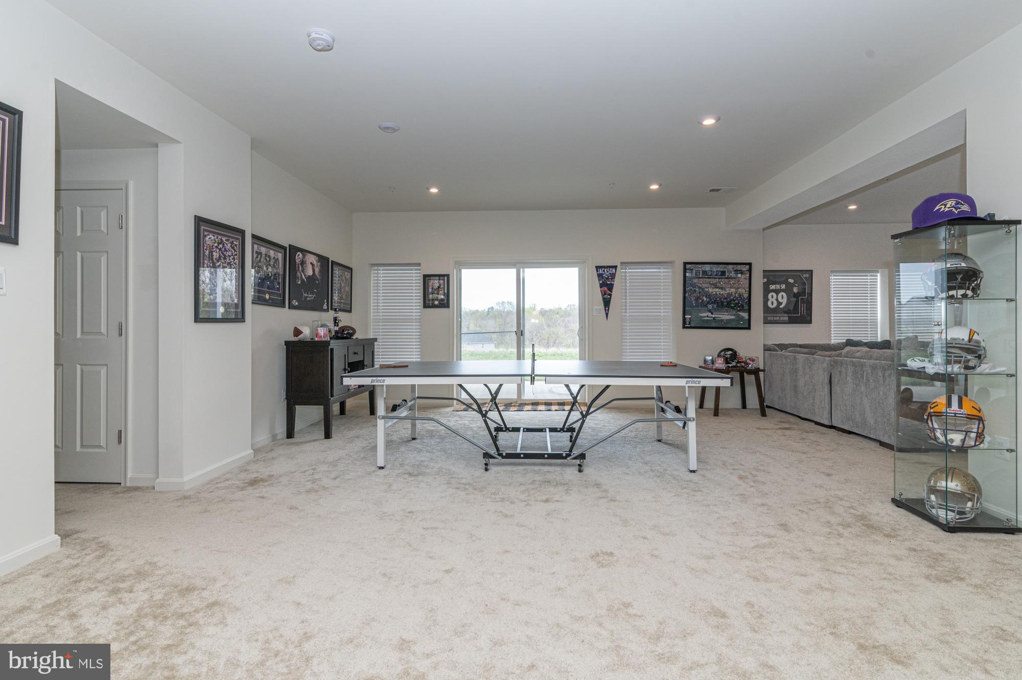 411 Karn Place Brunswick, MD 21716 - Photo 6 of 10 a living room with furniture and a table