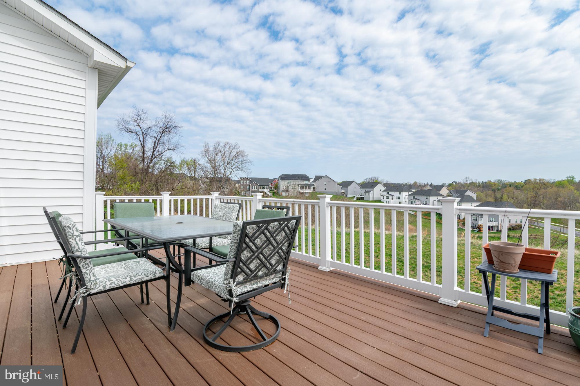 411 Karn Place Brunswick, MD 21716 - Photo 8 of 10 an outdoor view from a roof deck with wooden floor