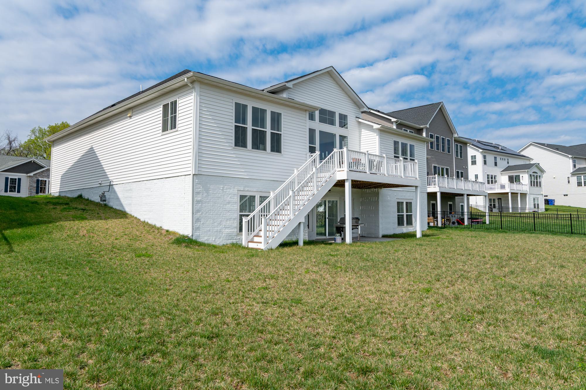 411 Karn Place Brunswick, MD 21716 - Photo 9 of 10 a view of a house with a yard