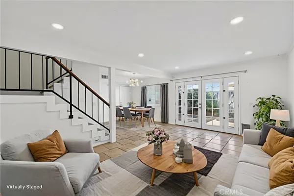 a living room with furniture and a table