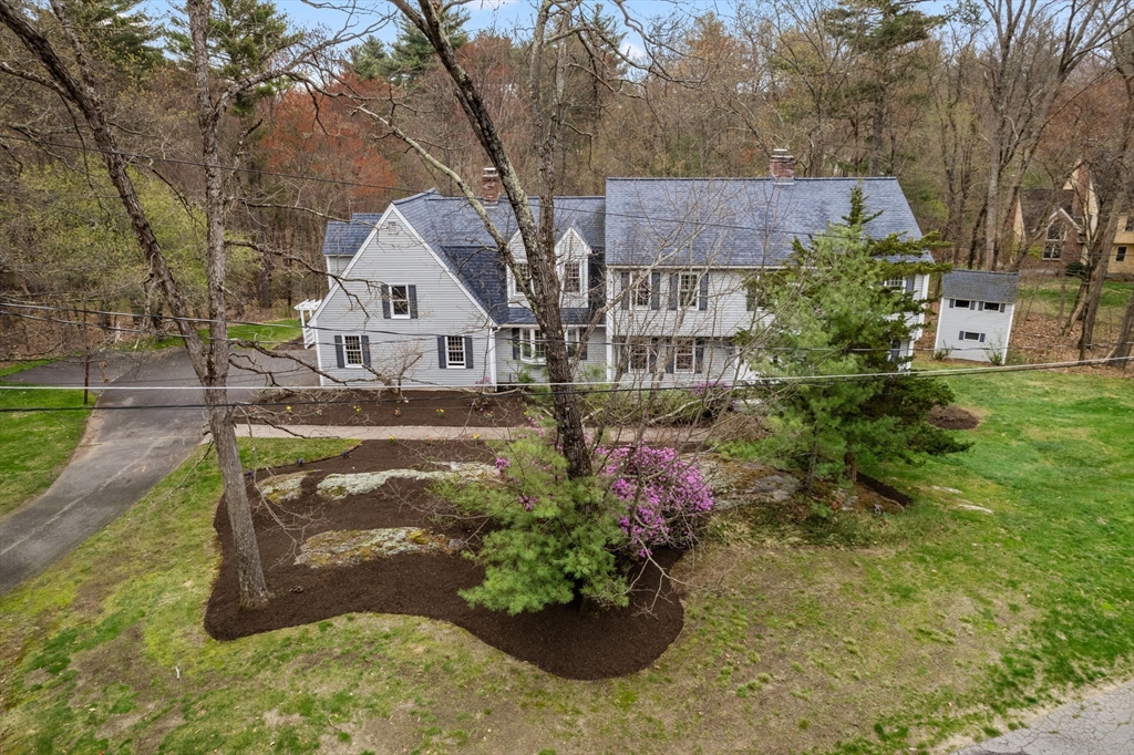 202 Newtown Road Acton, MA 01720 - Photo 2 of 40 a view of a house with a yard