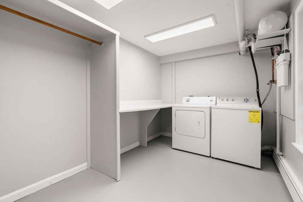 202 Newtown Road Acton, MA 01720 - Photo 31 of 40 a utility room with dryer and washer