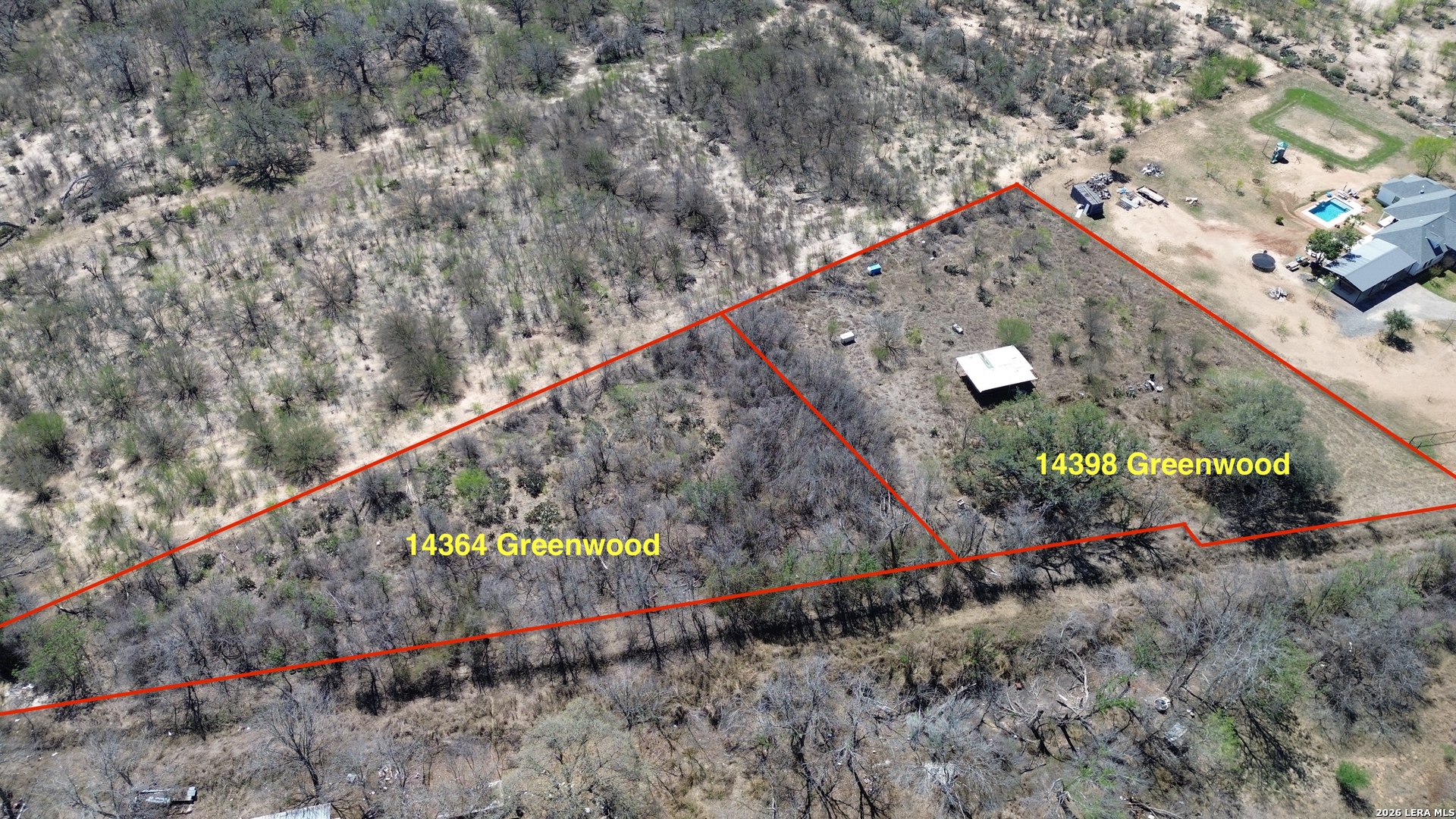 14364 Greenwood Road Atascosa, TX 78002 - Photo 4 of 10 a view of a wooden bridge