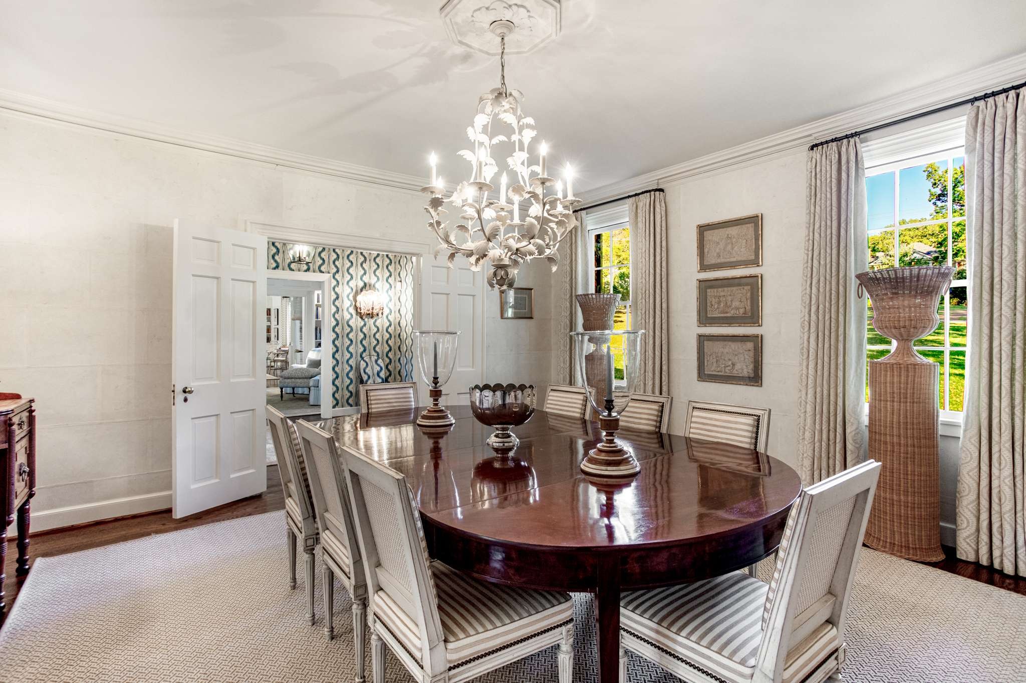4313 Estes Road Nashville, TN 37215 - Photo 7 of 25 a view of a dining room with furniture and a chandelier