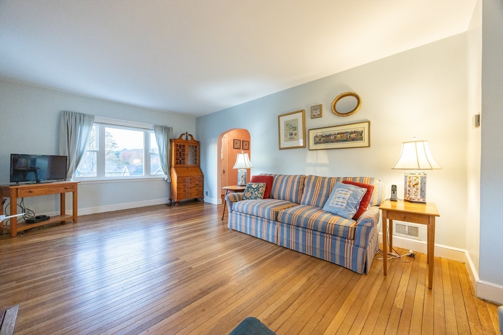 51 Barnstable Street Swampscott, MA 01907 - Photo 12 of 39 a living room with furniture and a wooden floor