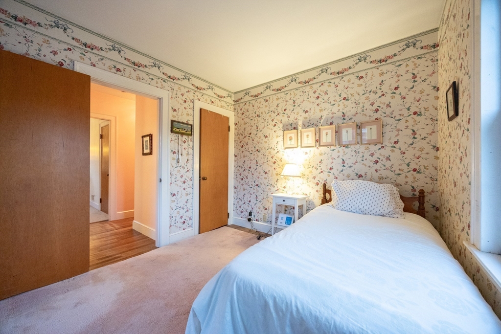 51 Barnstable Street Swampscott, MA 01907 - Photo 16 of 39 a bedroom with a large bed and a window