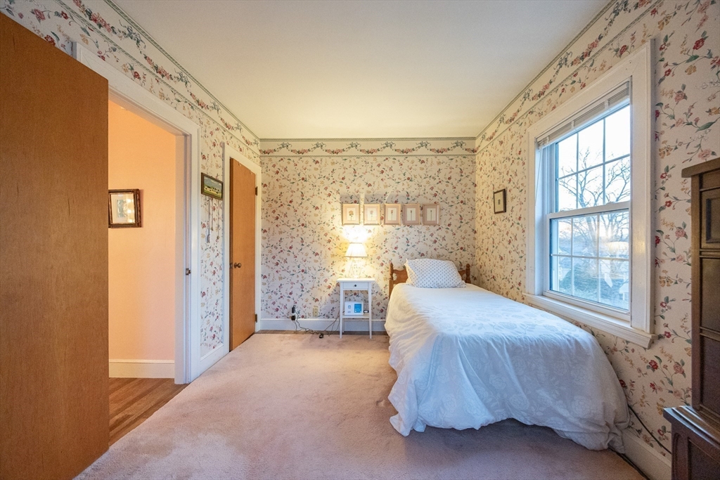 51 Barnstable Street Swampscott, MA 01907 - Photo 17 of 39 a bedroom with a bed and window