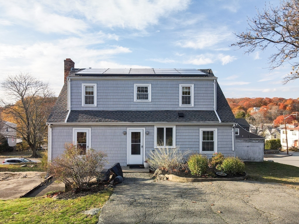 51 Barnstable Street Swampscott, MA 01907 - Photo 28 of 39 a front view of a house with a yard