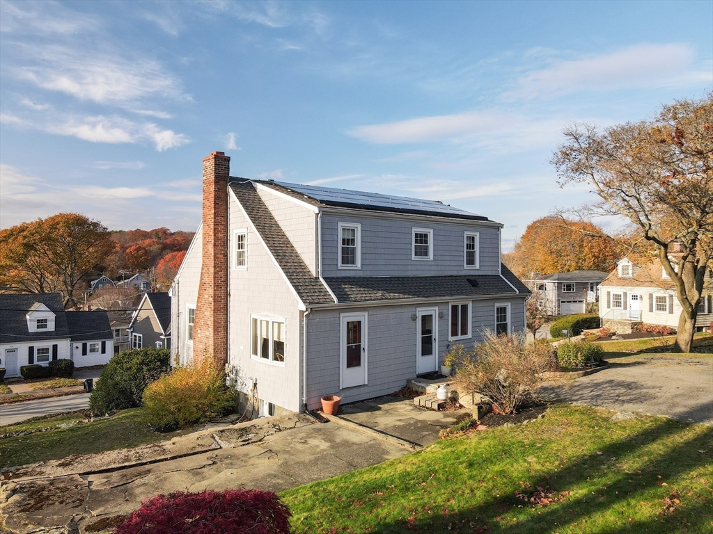 51 Barnstable Street Swampscott, MA 01907 - Photo 29 of 39 a front view of a house with a yard