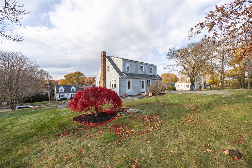 51 Barnstable Street Swampscott, MA 01907 - Photo 33 of 39 a view of a house with a big yard