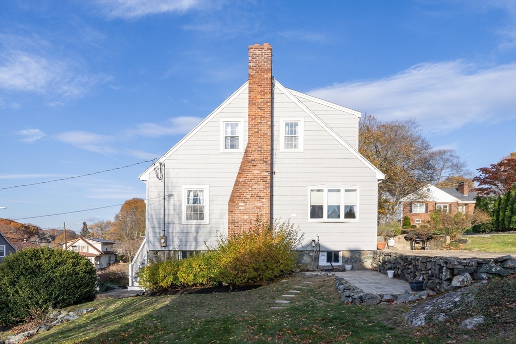 51 Barnstable Street Swampscott, MA 01907 - Photo 34 of 39 a view of a house with a yard