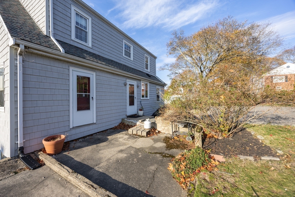 51 Barnstable Street Swampscott, MA 01907 - Photo 35 of 39 a view of a house with a yard