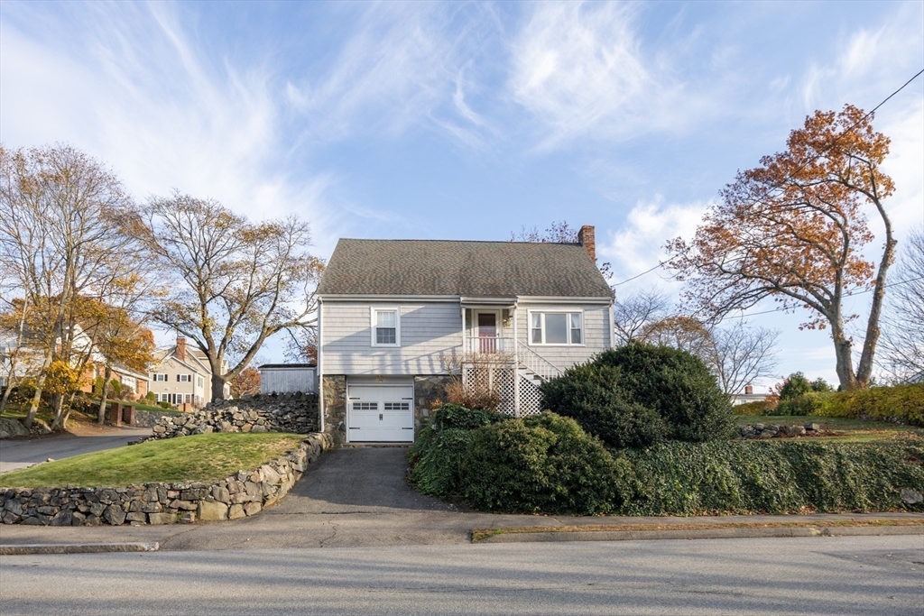 51 Barnstable Street Swampscott, MA 01907 - Photo 36 of 39 a front view of a house with a garden