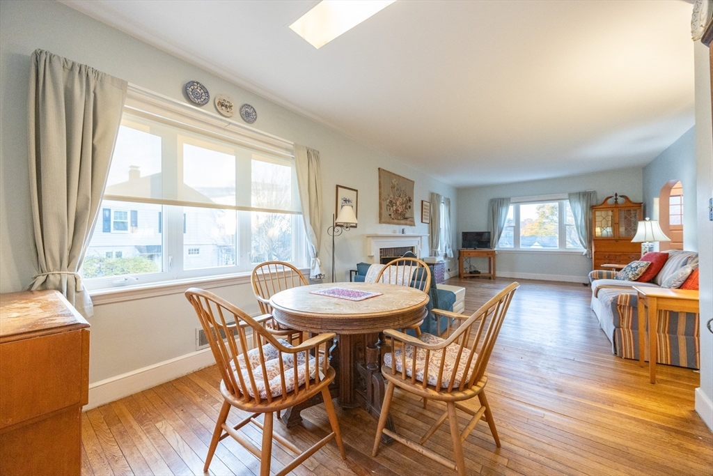 51 Barnstable Street Swampscott, MA 01907 - Photo 9 of 39 a dining room with furniture window and wooden floor