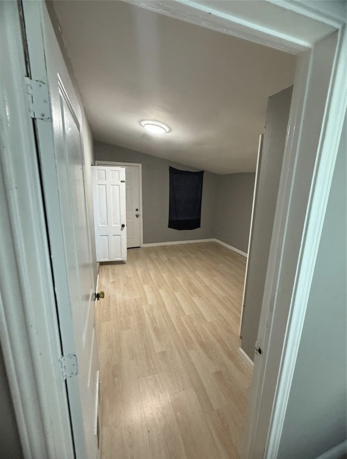 8412 Peekskill Lane Houston, TX 77075 - Photo 16 of 46 a view of hallway with wooden floor