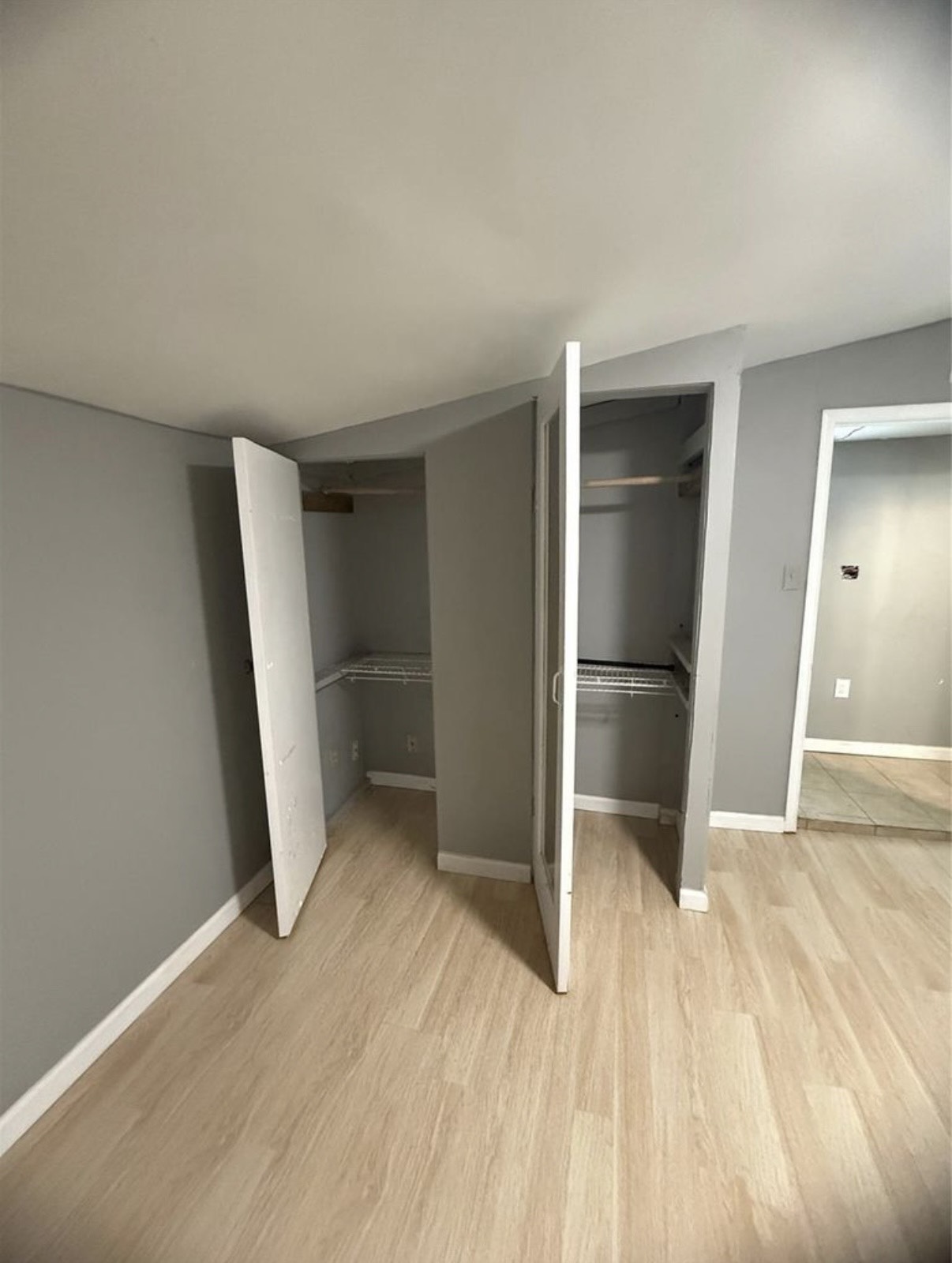 8412 Peekskill Lane Houston, TX 77075 - Photo 21 of 46 a view of empty room with wooden floor and closet
