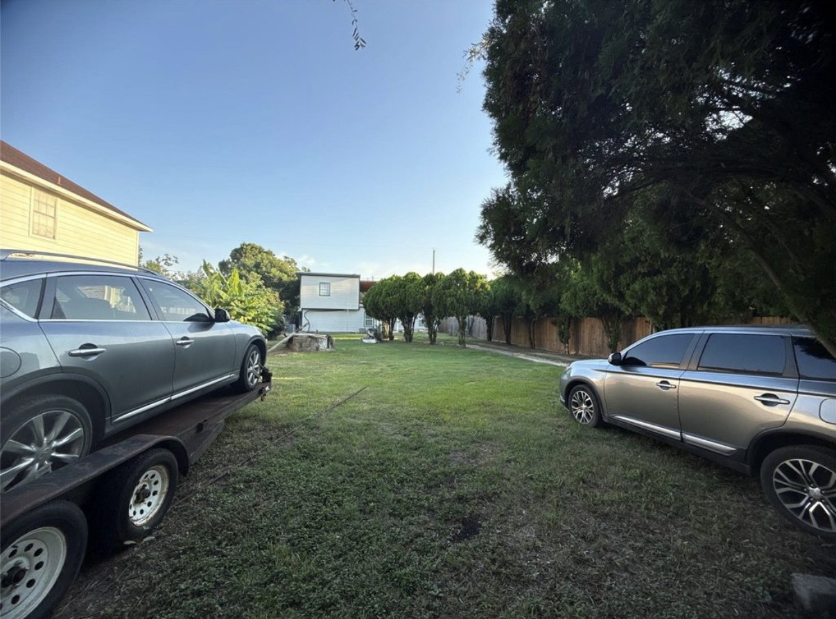 8412 Peekskill Lane Houston, TX 77075 - Photo 37 of 46 a view of a backyard with a car parked