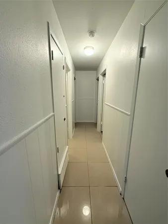 a view of hallway with stairs