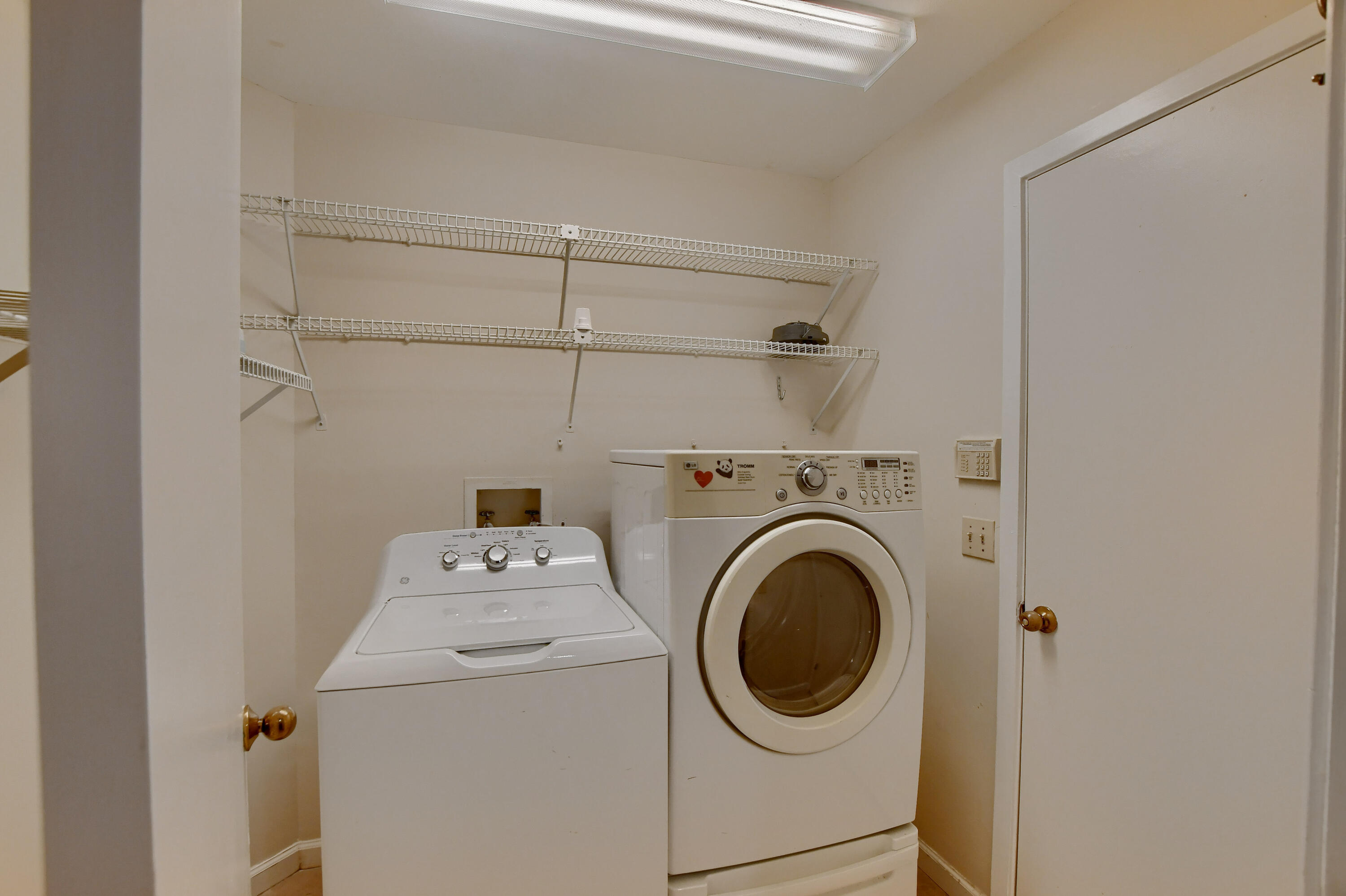 2252 Northwest 53rd Street Boca Raton, FL 33496 - Photo 19 of 41 a utility room with dryer and washer