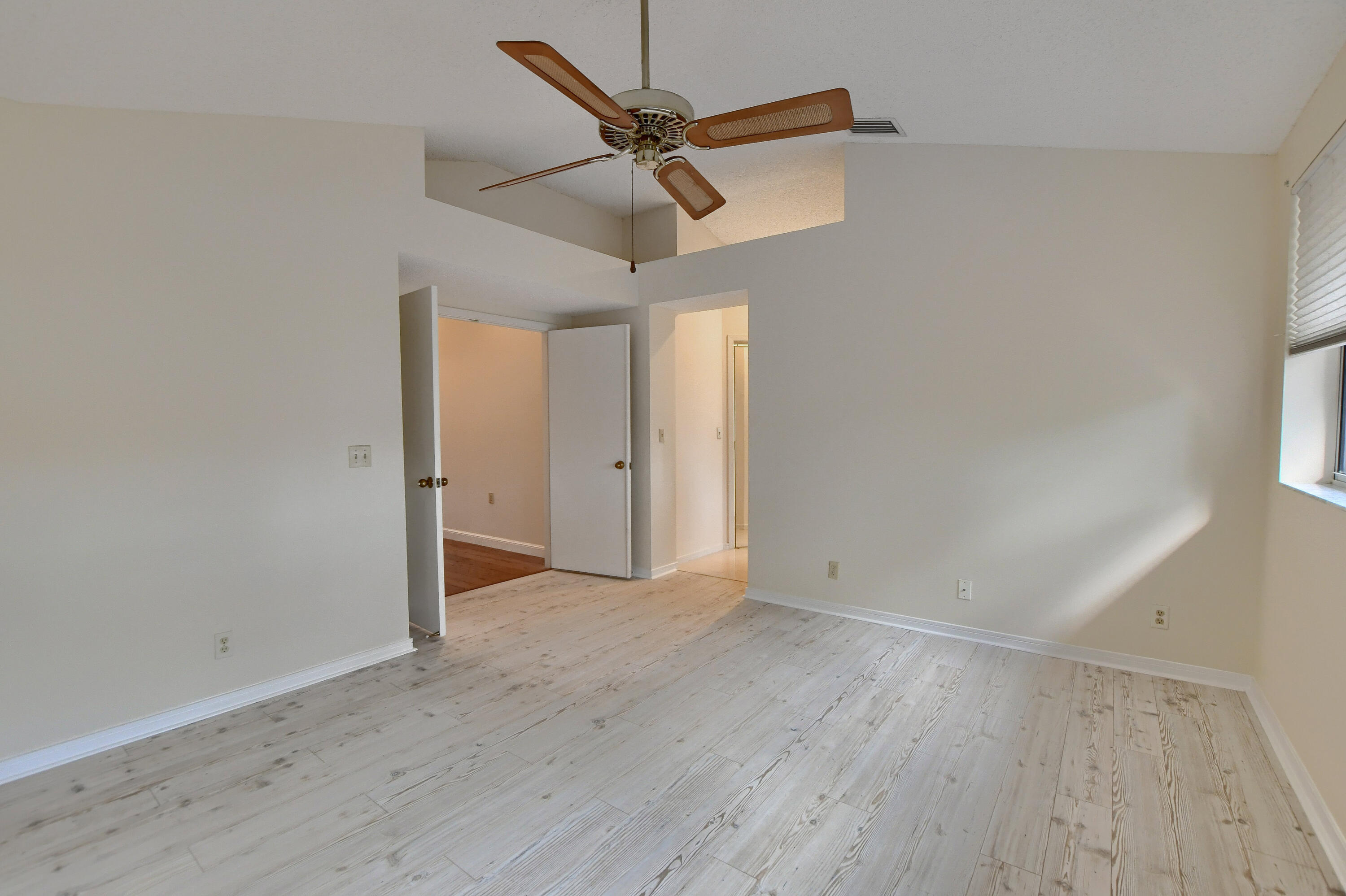 2252 Northwest 53rd Street Boca Raton, FL 33496 - Photo 25 of 41 wooden floor in an empty room