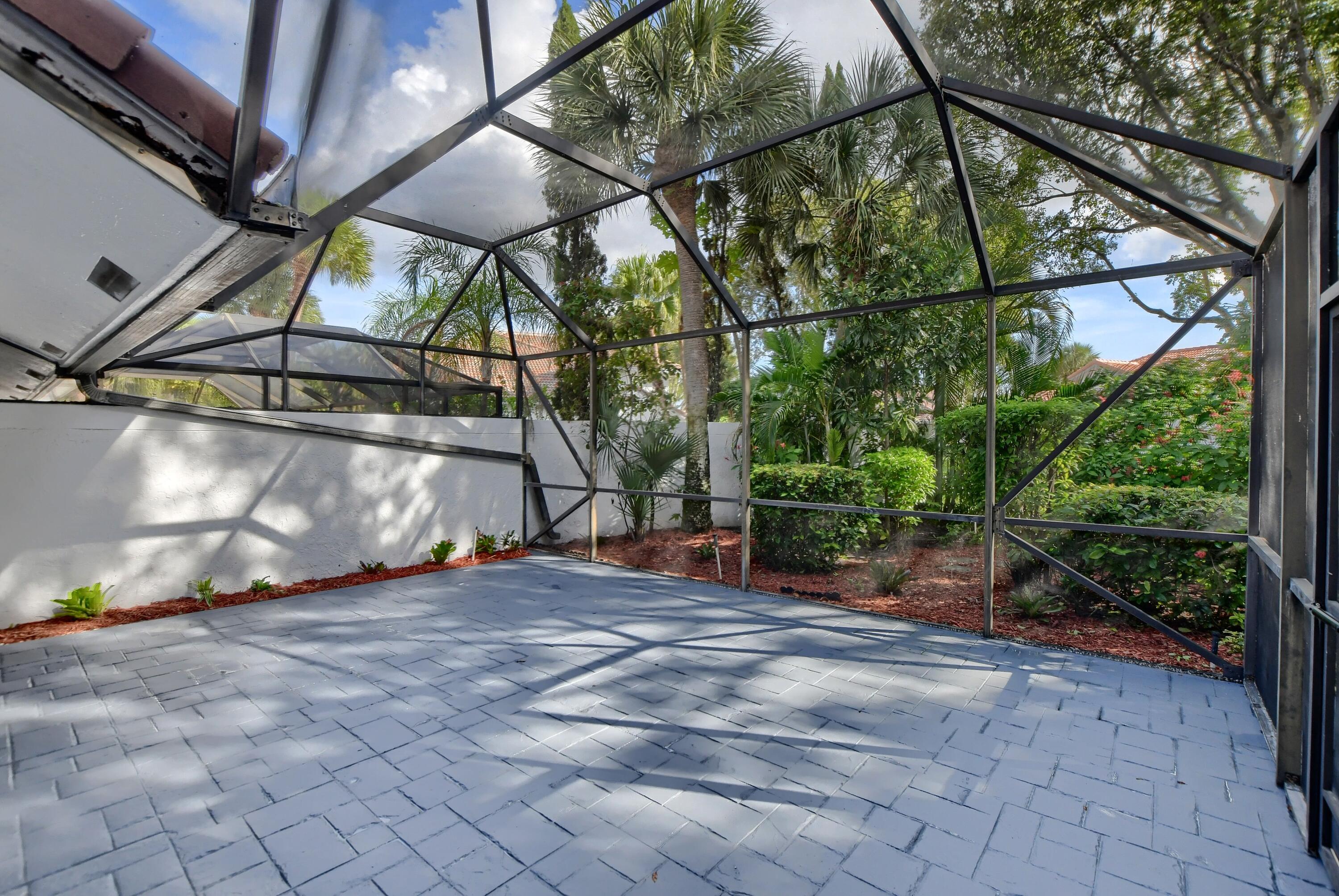 2252 Northwest 53rd Street Boca Raton, FL 33496 - Photo 39 of 41 a view of a backyard