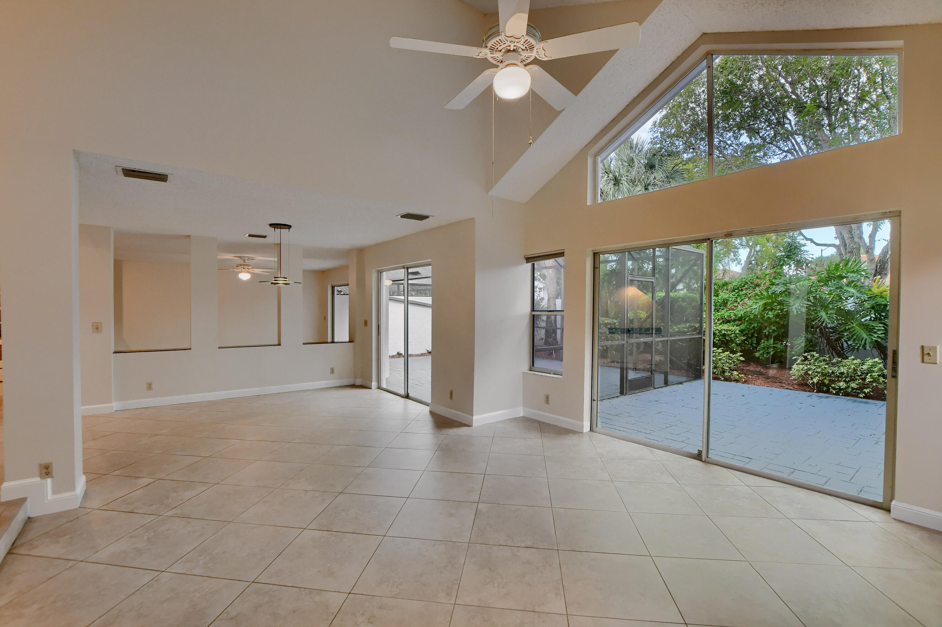 2252 Northwest 53rd Street Boca Raton, FL 33496 - Photo 7 of 41 a view of an empty room with windows
